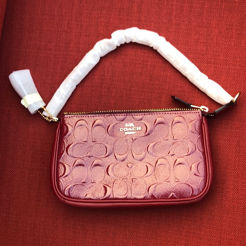 NWOTCoach Signature Debossed In Cherry/Gold Patent